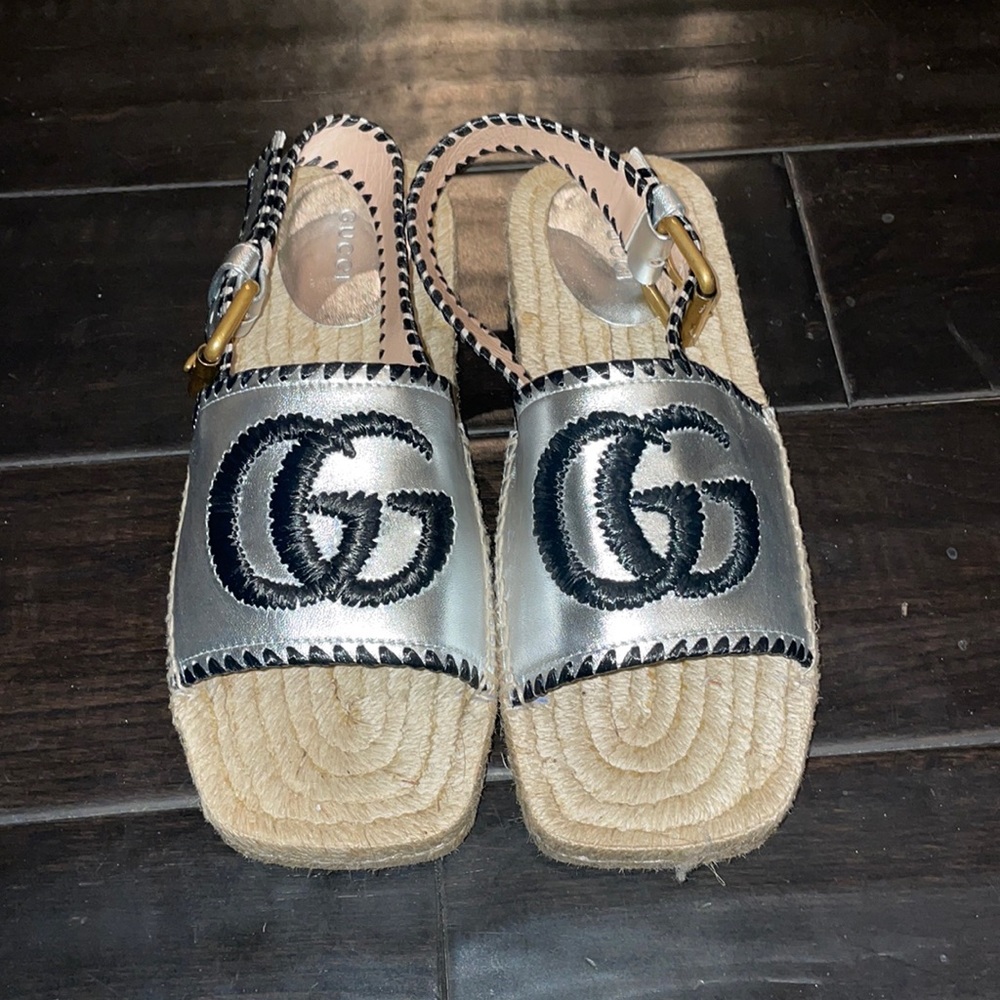 Gucci espadrille sandals. Silver and black. Gold buckle. Never warn